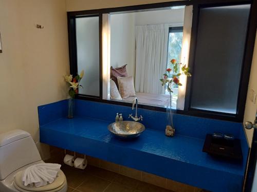 A bathroom at Amarin Samui Hotel - SHA Plus Certified