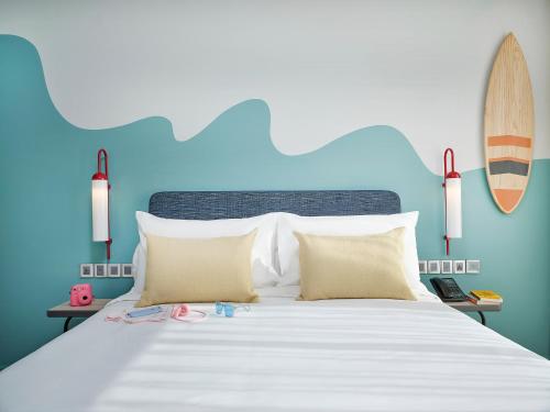 Postel nebo postele na pokoji v ubytování ibis Styles Vung Tau
