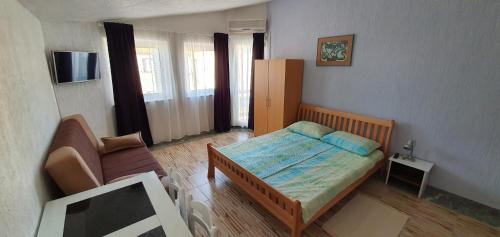 Un pat sau paturi într-o cameră la Apartments Japuncic