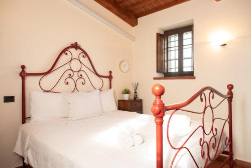 เตียงในห้องที่ Costanza - Appartamento in Torre