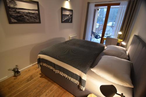 Postel nebo postele na pokoji v ubytování Apartman Milíř - ADULTS ONLY
