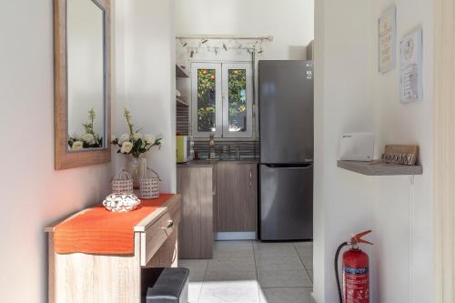 Η κουζίνα ή μικρή κουζίνα στο Sweet Home Kremasti