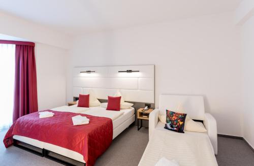 Кровать или кровати в номере Hotel Stadtfeld