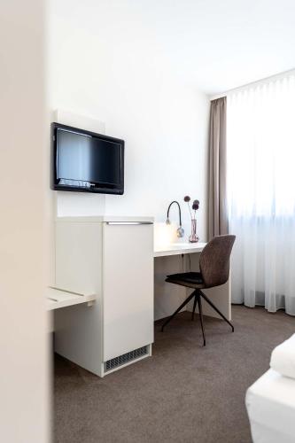 Televisyen dan/atau pusat hiburan di Altstadthotel