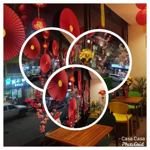 a collage of photos of red paper umbrellas at Amazing Rooms in Semporna