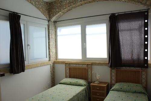 Voodi või voodid majutusasutuse Villa Simonetta toas
