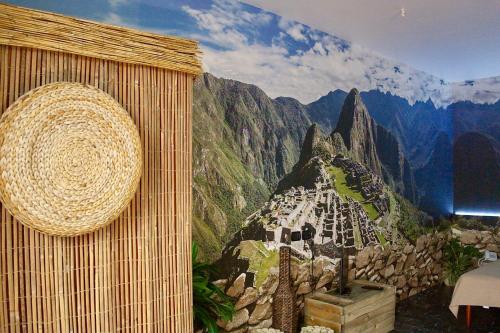 a room with a mountain mural on the wall at Ahr Hotel Villa Alighieri in Stra
