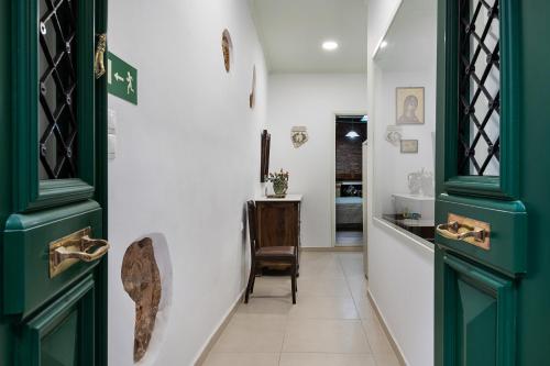 
a kitchen with a stove and a refrigerator at Anastasia Apartments in Chania
