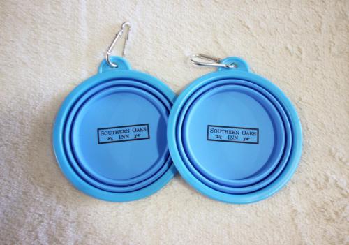 a pair of blue earrings with a sign that reads customer was a mess at Southern Oaks Inn - Saint Augustine in Saint Augustine