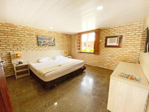 Cama o camas de una habitación en Hotel Parque das Fontes
