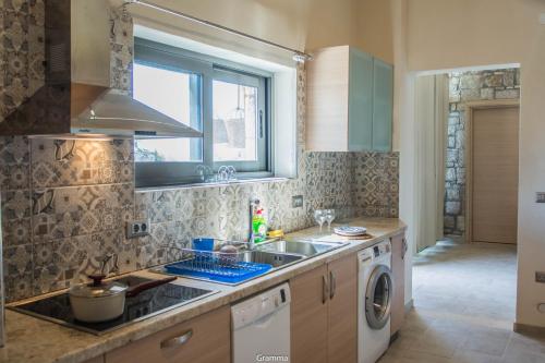 Η κουζίνα ή μικρή κουζίνα στο Villa Sealine