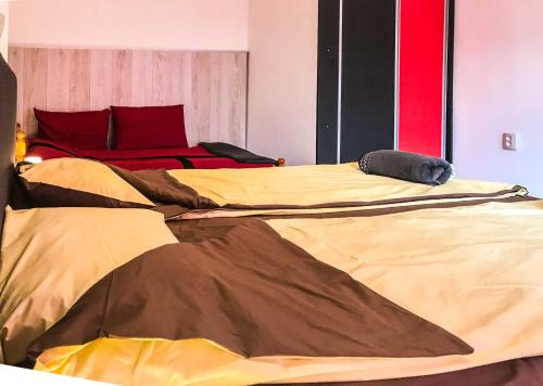 Postel nebo postele na pokoji v ubytování Red House