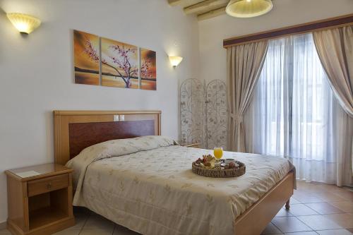 Postel nebo postele na pokoji v ubytování Hotel Anatolia