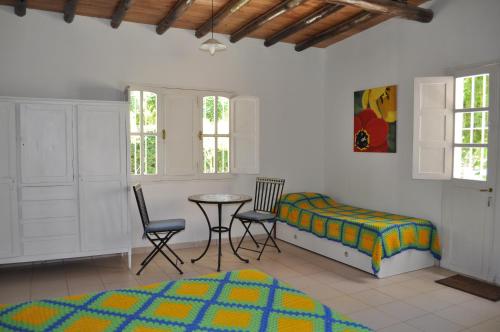 A bed or beds in a room at El Ensueño