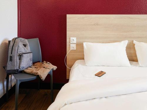 hotel F1 Vannesにあるベッド