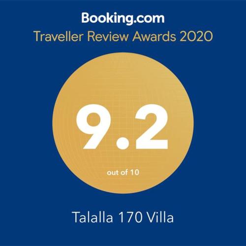 a yellow circle with the number twentytwo on it at Talalla 170 Villa in Talalla
