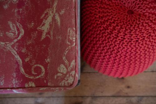a red book sitting on top of a wooden table at Pirralilla Estate Adelaide Hills in Aldgate