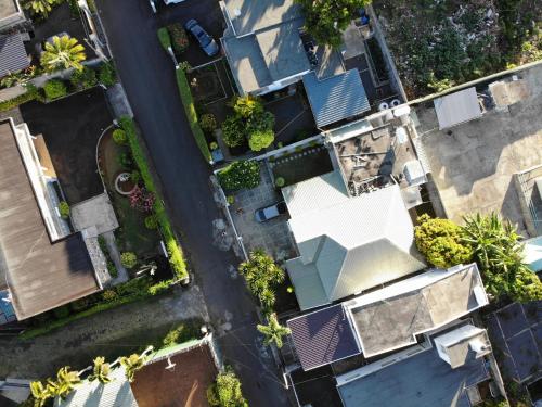an overhead view of a house with a street at Villa Ebène - Ideal Location in Rose Hill in Rose Hill