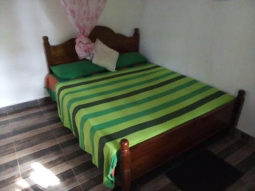 Ein Bett oder Betten in einem Zimmer der Unterkunft Safari lodge sigiriya junction
