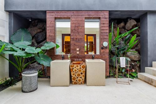 a bathroom with a sink and some plants at The Bale Villas牛眠埔里 in Puli