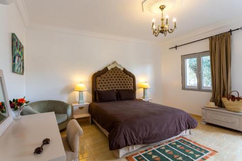 Postel nebo postele na pokoji v ubytování Villa Ayche