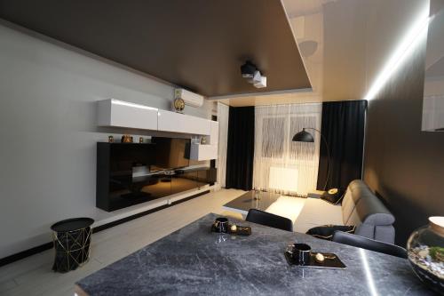 Posteľ alebo postele v izbe v ubytovaní Apartament Lema Versace
