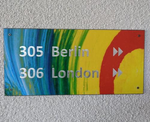 a sign that says bernin london on a wall at 305 Berlin, Studio Apartment, 38m2 2-4 Pers in Klagenfurt