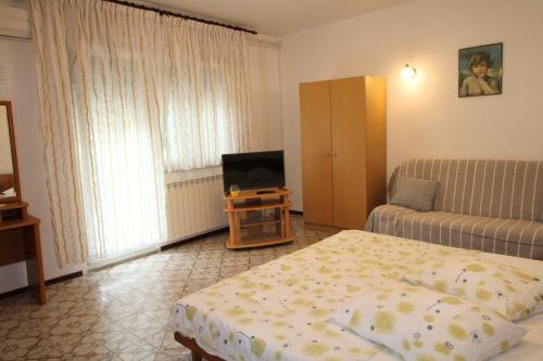 Postel nebo postele na pokoji v ubytování Apartment Valentina