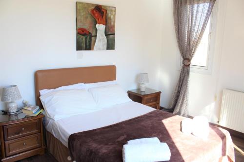 Ένα ή περισσότερα κρεβάτια σε δωμάτιο στο Natali villa in a perfect location