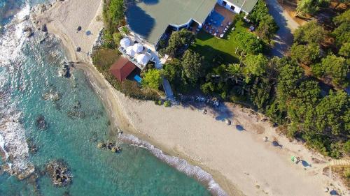 an aerial view of a beach and the ocean at BAGHEERA Village Naturiste in Linguizzetta