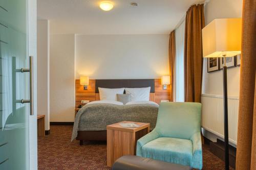 Postel nebo postele na pokoji v ubytování Centro Hotel Sautter