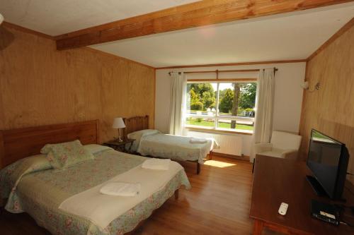 Cama o camas de una habitación en Hotel Casa de la Oma