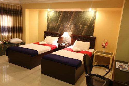 Katil atau katil-katil dalam bilik di Eastern House