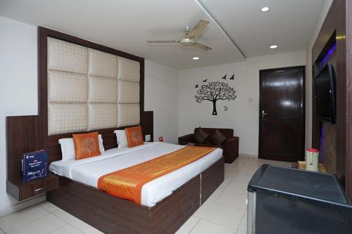 Krevet ili kreveti u jedinici u objektu OYO 1526 Gagan Plaza Hotel