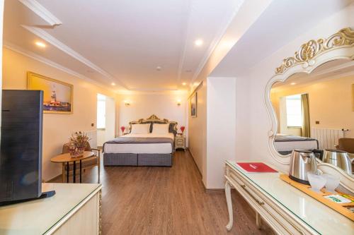 Katil atau katil-katil dalam bilik di Almadina Hotel Istanbul