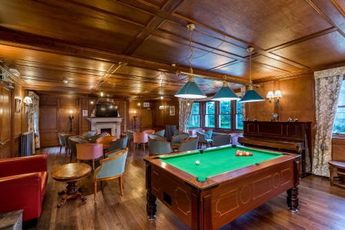 a billiard room with a pool table at Grey Harlings Hotel in Montrose