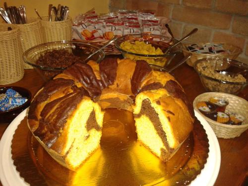 a loaf of bread sitting on top of a table at Osteria Della Posta in Poggio Picenze