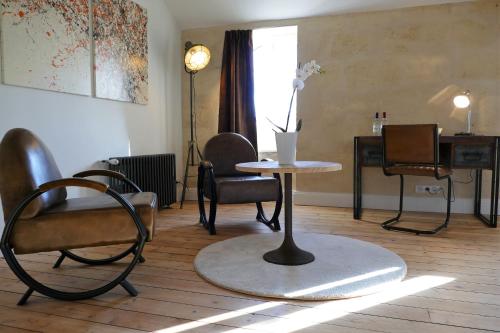 Posezení v ubytování Le Clos des Queyries, Chambres d'Hôtes