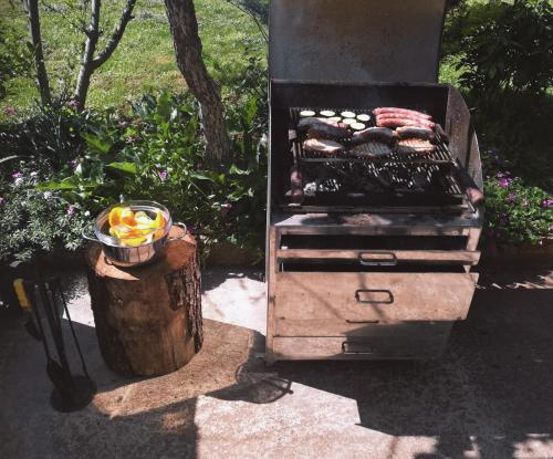 a grill with a bunch of food on it at Apartment Gabi in Umag
