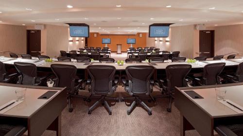a large conference room with a large table and chairs at Grand Hyatt San Francisco Union Square in San Francisco