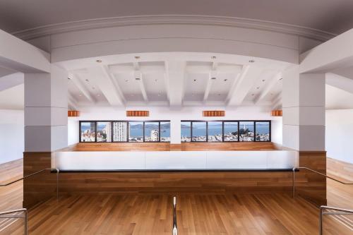 a large room with white walls and wood floors at Grand Hyatt San Francisco Union Square in San Francisco