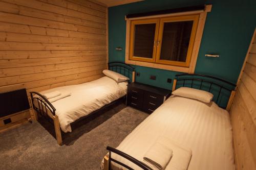Postel nebo postele na pokoji v ubytování iLodge Ultra