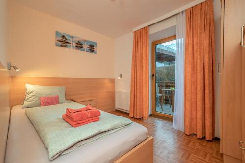 Postel nebo postele na pokoji v ubytování Haus Brandner