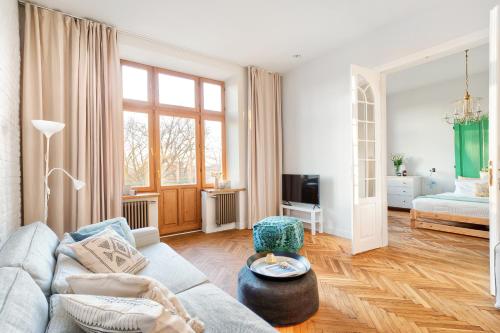 Televízia a/alebo spoločenská miestnosť v ubytovaní Dream Apartment - LoftAffair