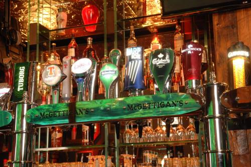 a bar with a bunch of bottles of alcohol at Clanree Hotel & Leisure Centre in Letterkenny