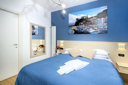 Postel nebo postele na pokoji v ubytování B&B Sorrento Queen