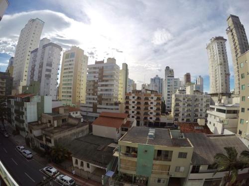 a view of a city with tall buildings at Apto alto padrão in Balneário Camboriú