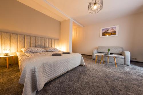 Ein Bett oder Betten in einem Zimmer der Unterkunft Willa Maria i Natasza