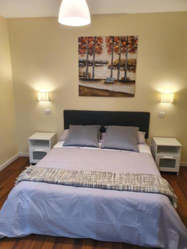 En eller flere senge i et værelse på Casa ManPer playa, Alcaravaneras, 3 dormitorios