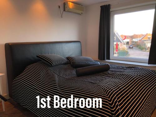 Postel nebo postele na pokoji v ubytování Amsterdam Twiskehouse
